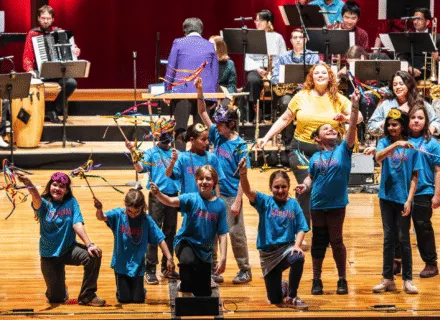 Kids performing on stage 